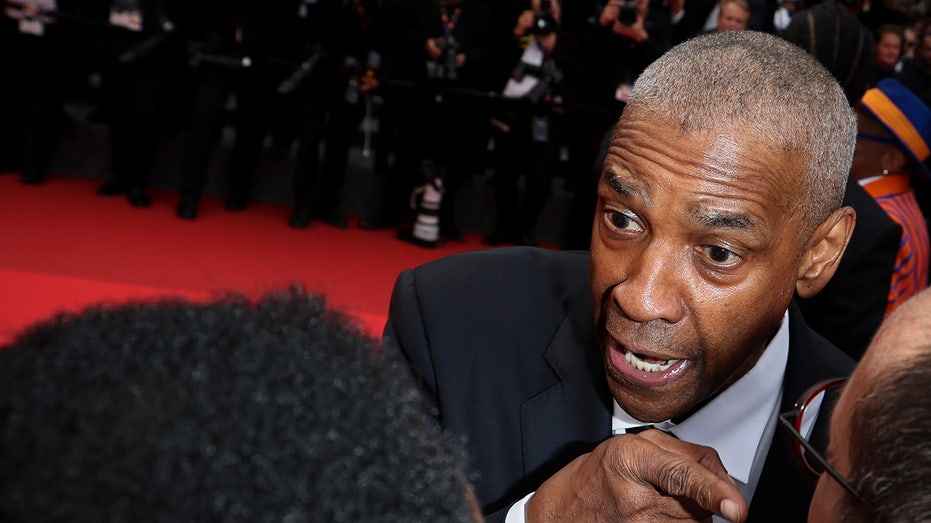 Denzel Washington Debunks Cannes Bailout Rumors, Honored with Palme d’Or