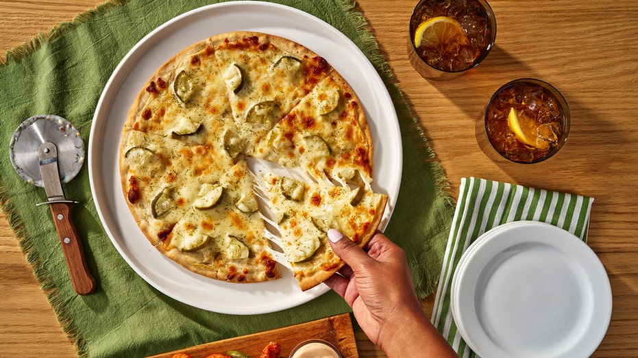 Dill Pickle Pizza Arrives in Freezers: California Pizza Kitchen's Bold Move Divides Fans