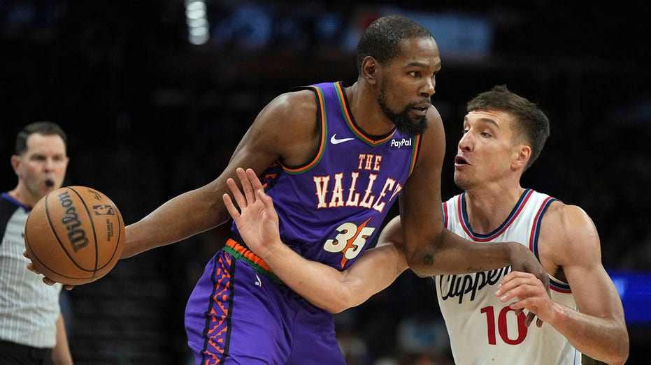 Suns' Kevin Durant and Coach Mike Budenholzer Share Fiery Exchange During Epic Comeback Win