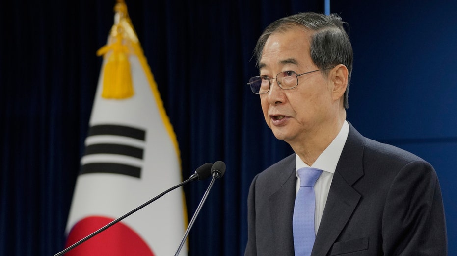 south-korean-pm-han-duck-soo-reinstated-as-acting-president-after-impeachment-overturned
