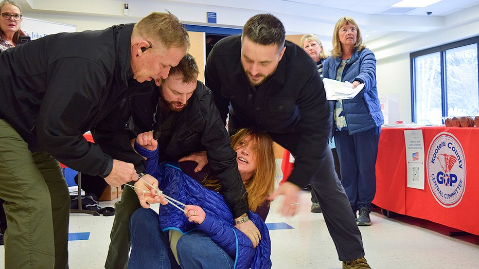 Private Security Guards Face Charges After Dragging Idaho Woman From Town Hall
