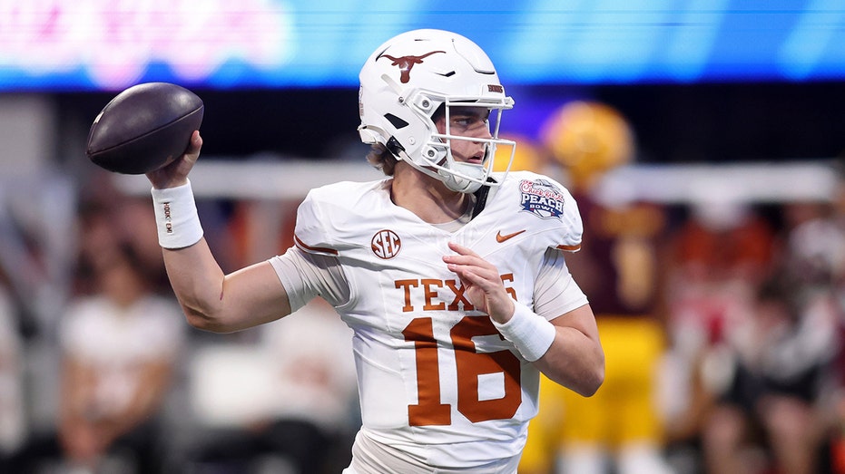 Arch Manning Compared to Texas Legend Vince Young Ahead of Ohio State Clash