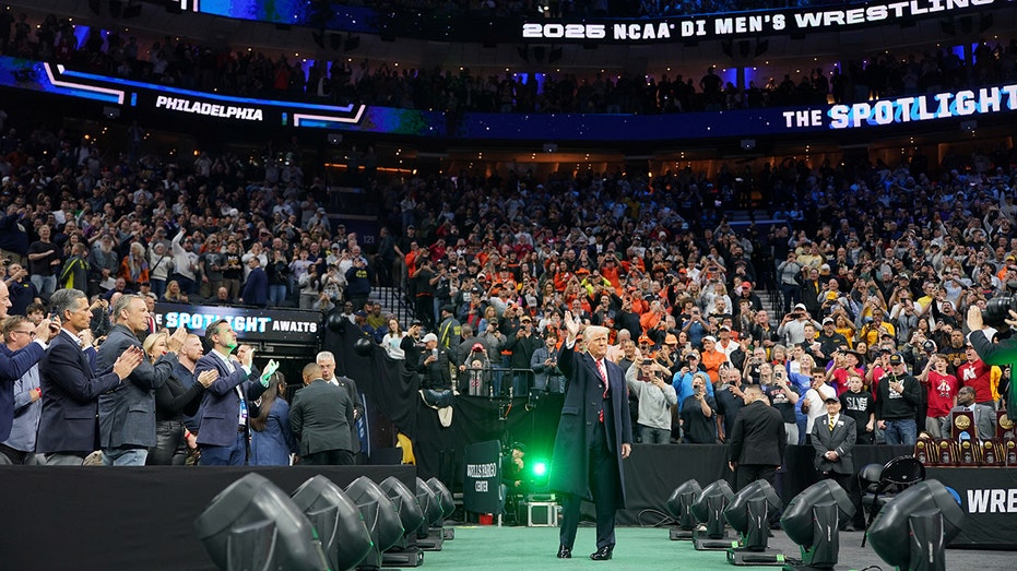 Trump Welcomed Loudly at NCAA Wrestling Championships: A Presidential Pin