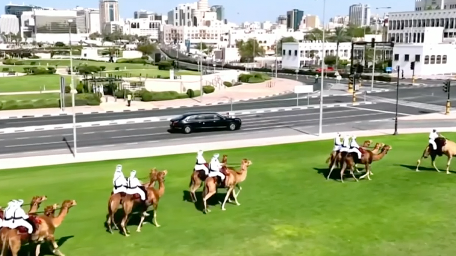 Trump Greeted by Camels and Cybertrucks in Qatar, Signs Major Boeing Deal