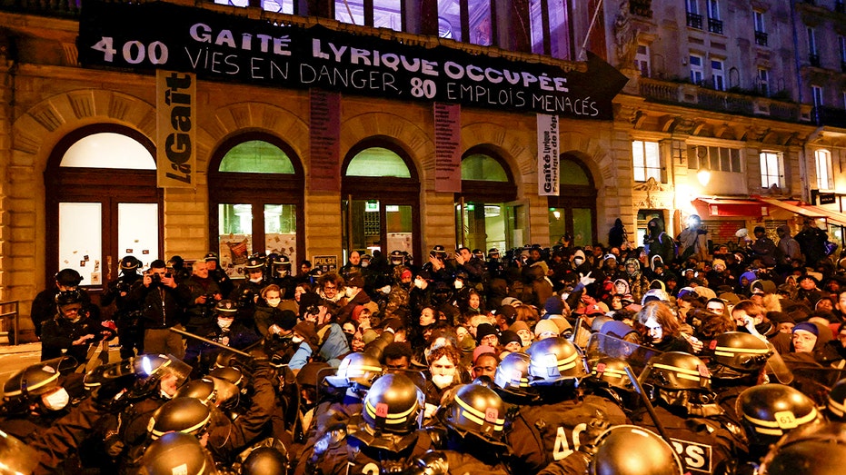 Hundreds of Migrants Evicted from Paris Theater After Months of Squatting