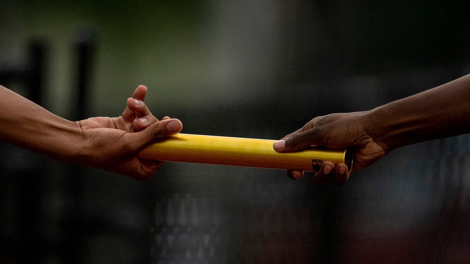 High School Track Star Cleared to Compete After Baton Incident Sparks Controversy