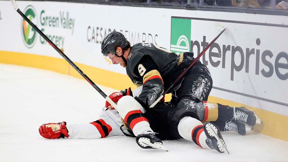 Devils' Jack Hughes Suffers Gruesome Shoulder Injury After Crashing Into Boards