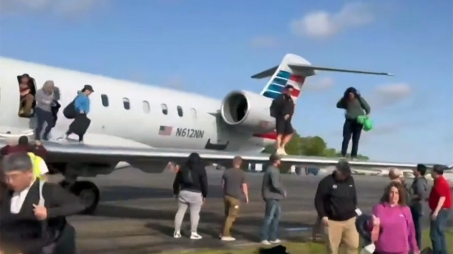 American Airlines Passengers Evacuate Plane via Wing After Smoke Incident in Georgia